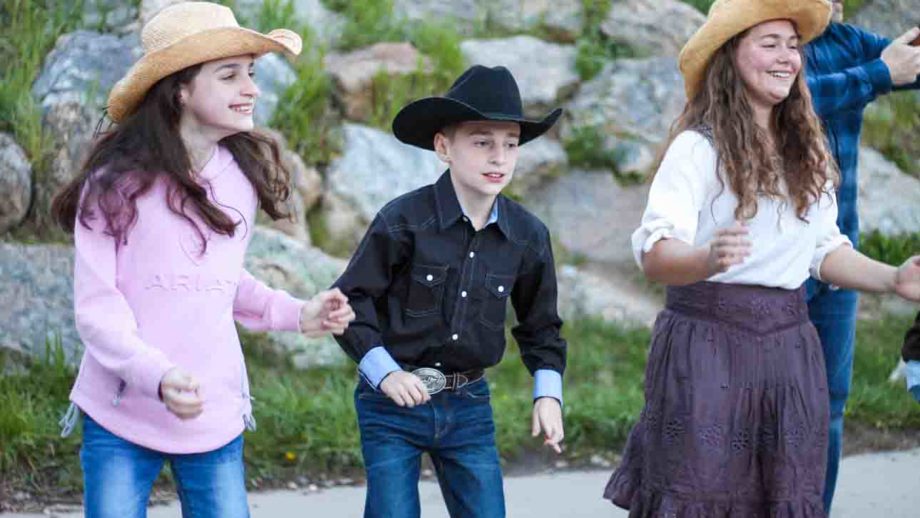 Children in cowboy hats